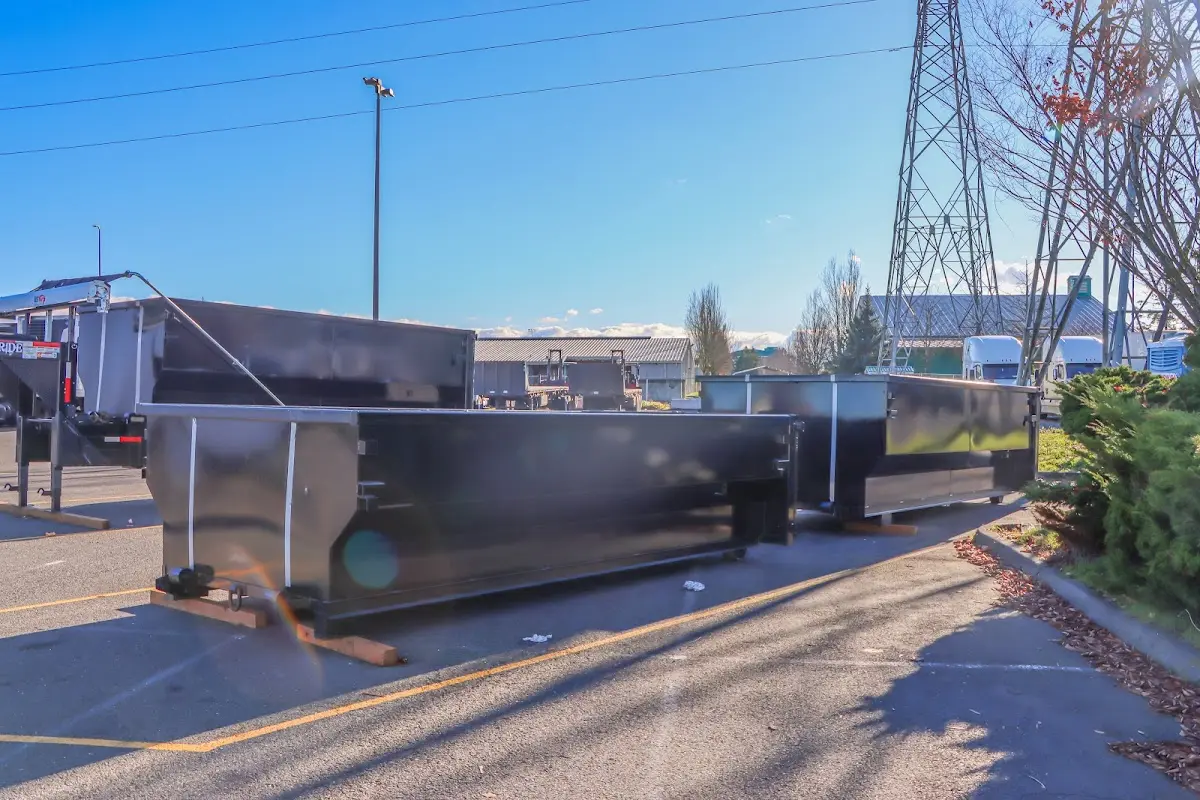 Roll-off dumpster ready for waste disposal at job site for Construction Dumpster Rental in Malta